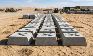 Reinforced precast concrete fence base feet for mesh fencing, UAE